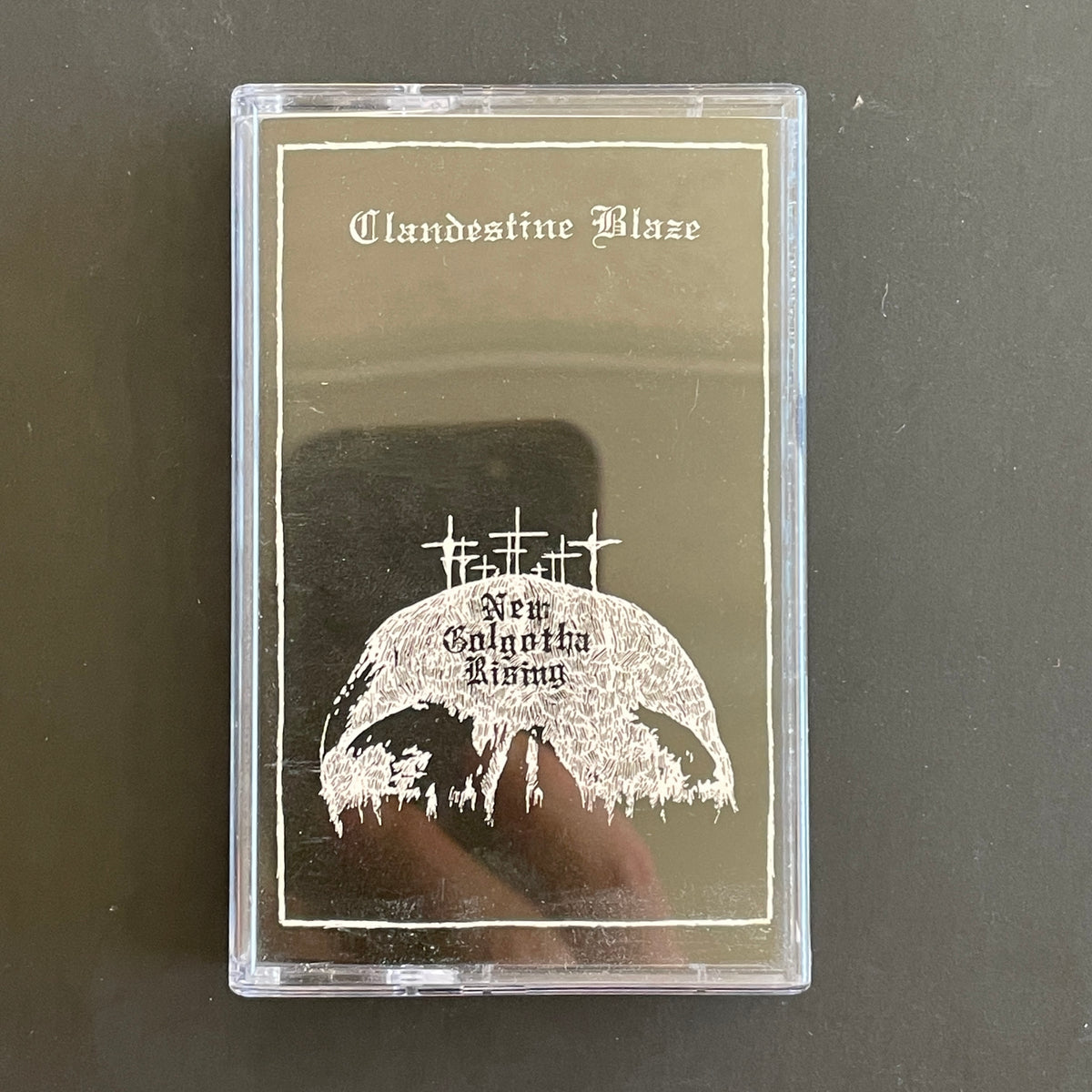Clandestine Blaze – New Golgotha Rising cassette tape (used)