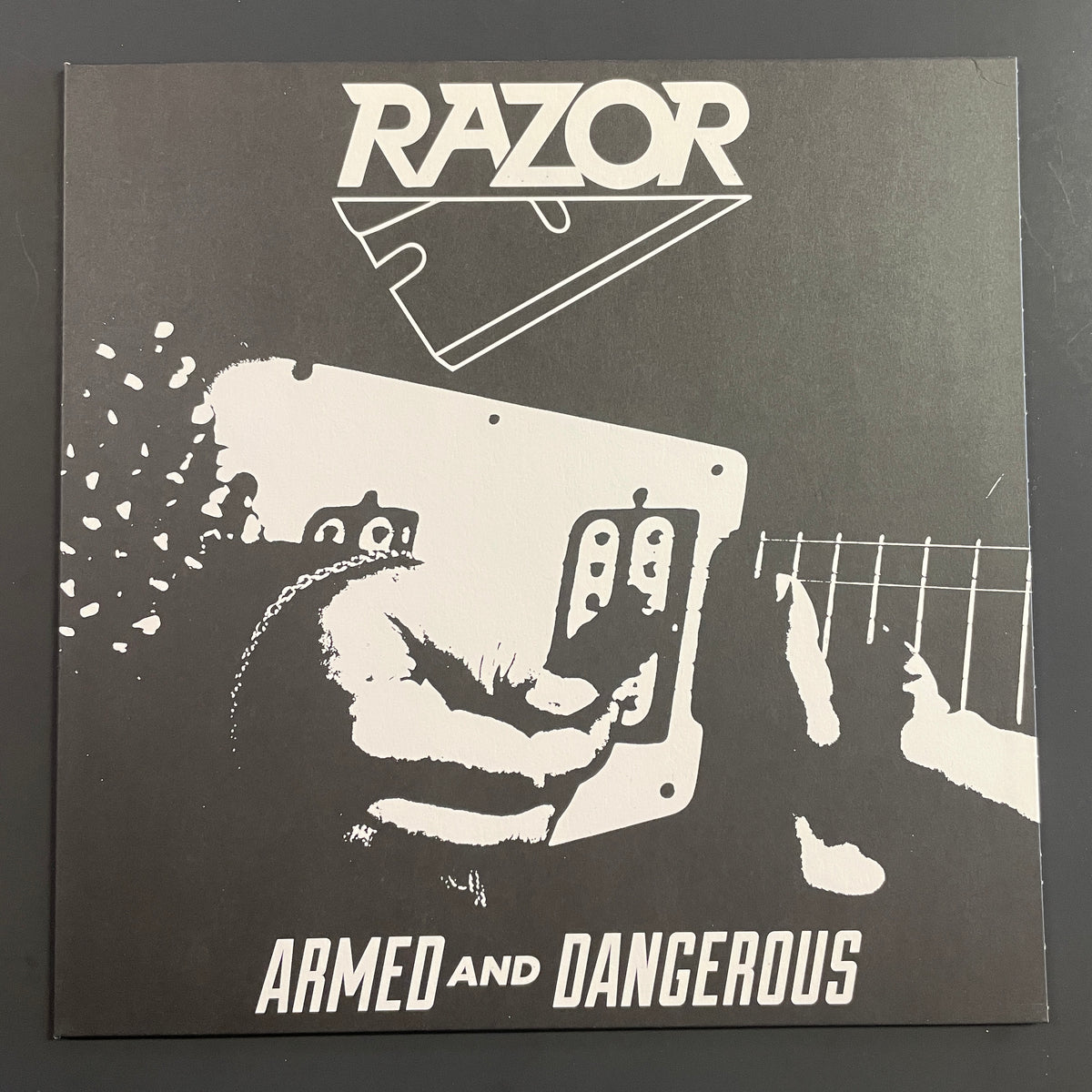 Razor – Armed And Dangerous LP (used)
