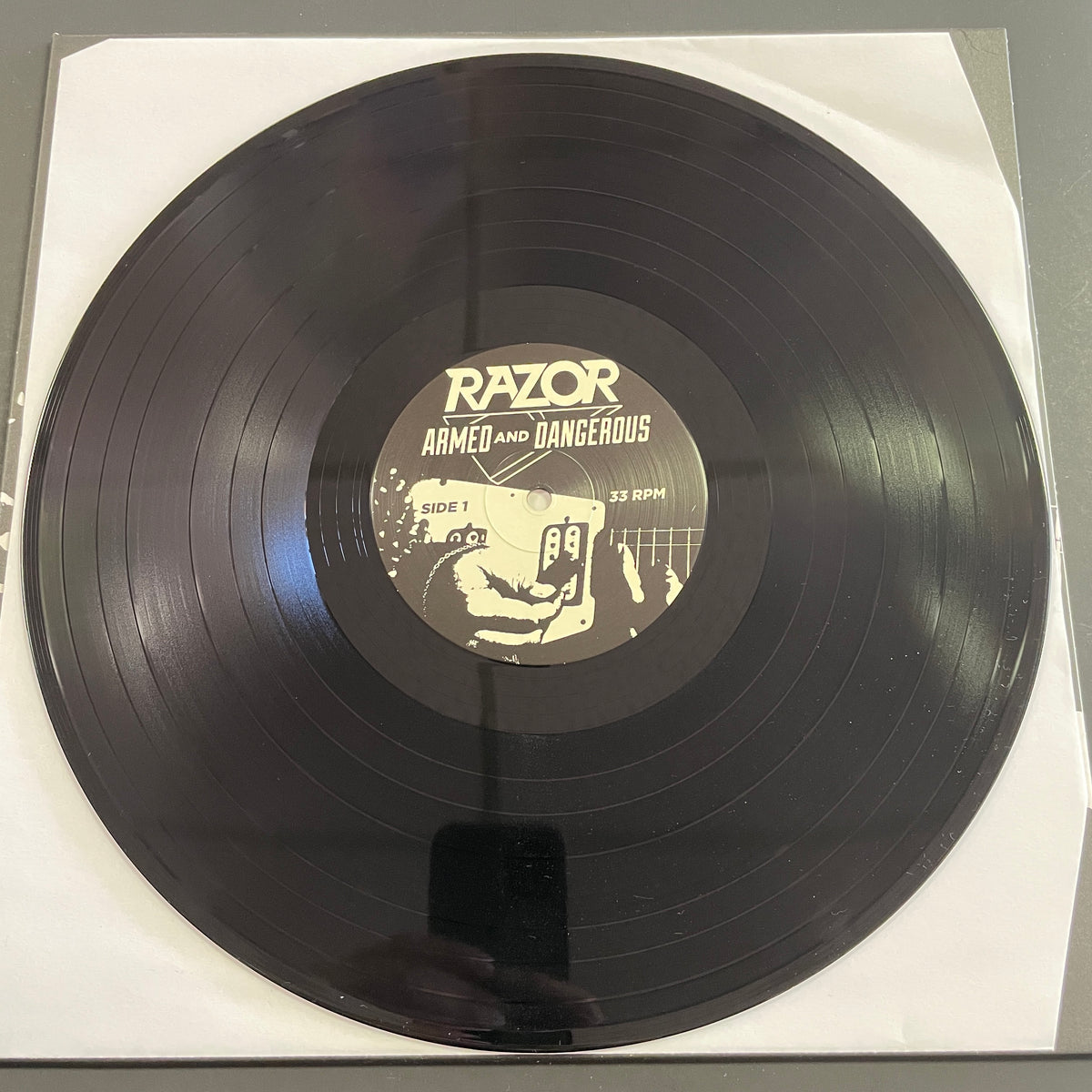 Razor – Armed And Dangerous LP (used)