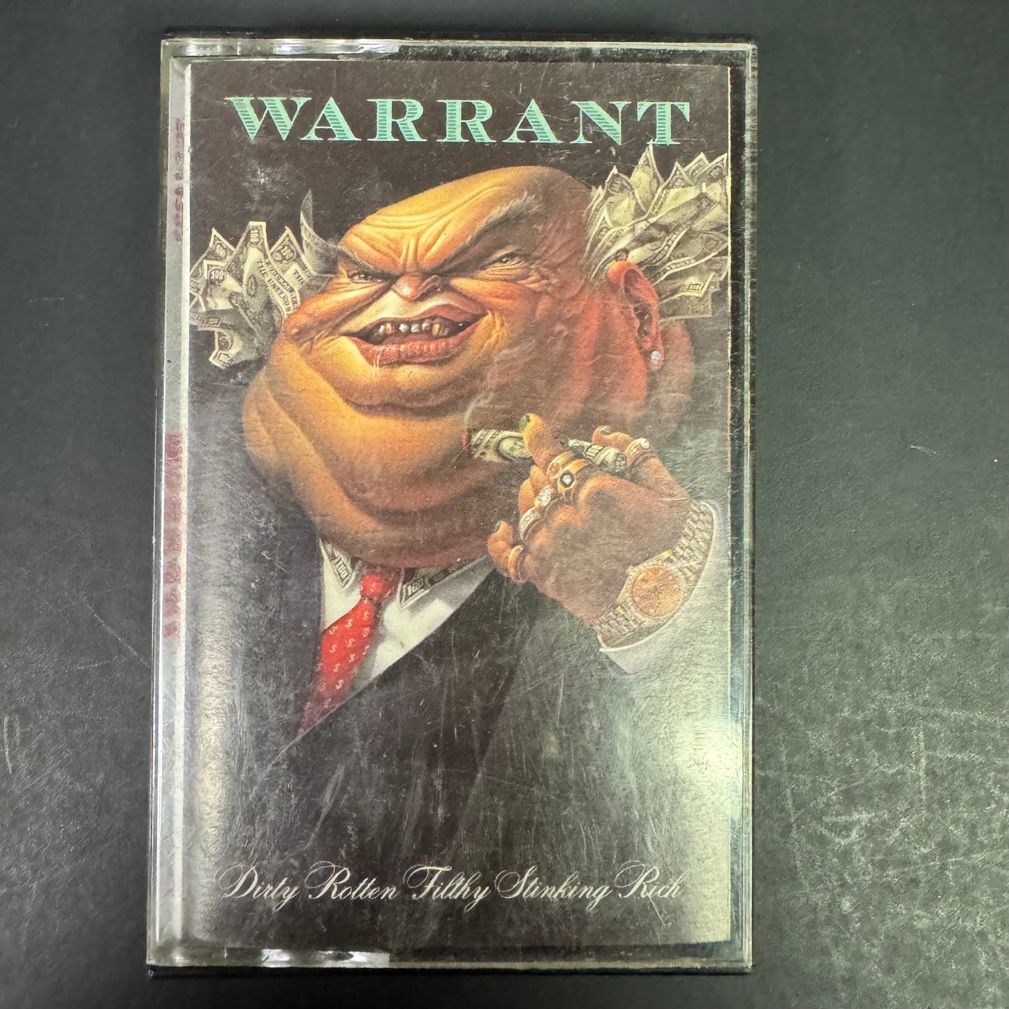 Warrant – Dirty Rotten Filthy Stinking Rich original cassette tape (used)
