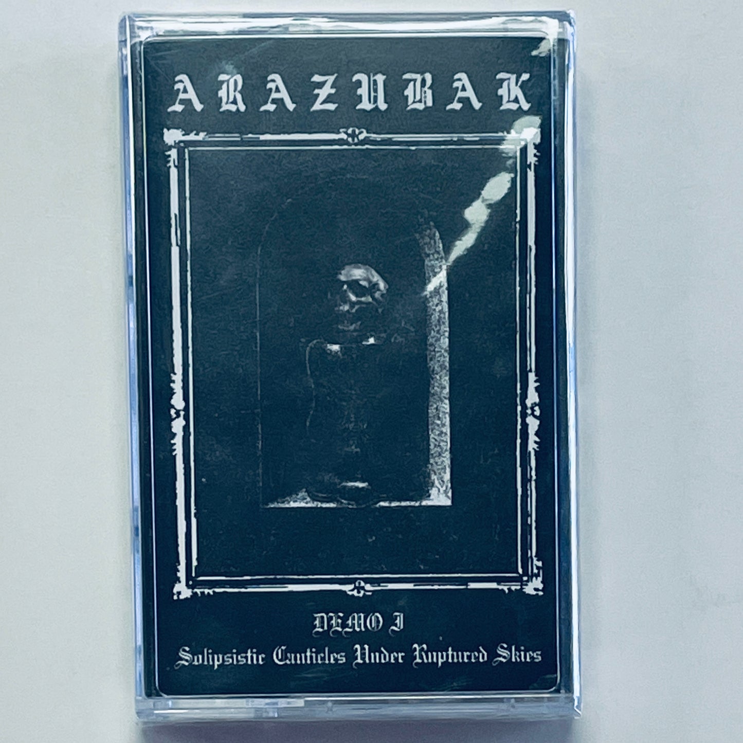 Arazubak – Demo I - Solipsistic Canticles Under Ruptured Skies cassette tape (used)