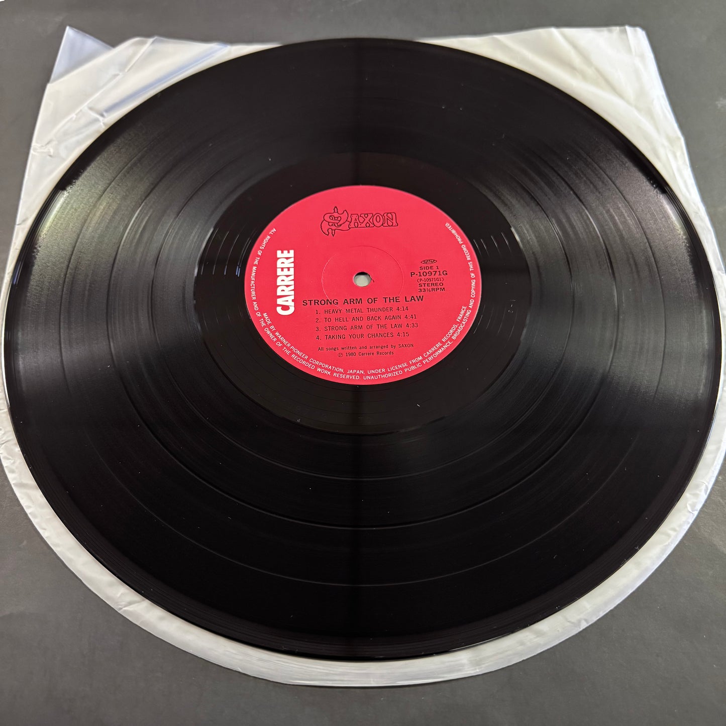 Saxon - Strong Arm of the Law original LP - Japanese pressing with obi (used)