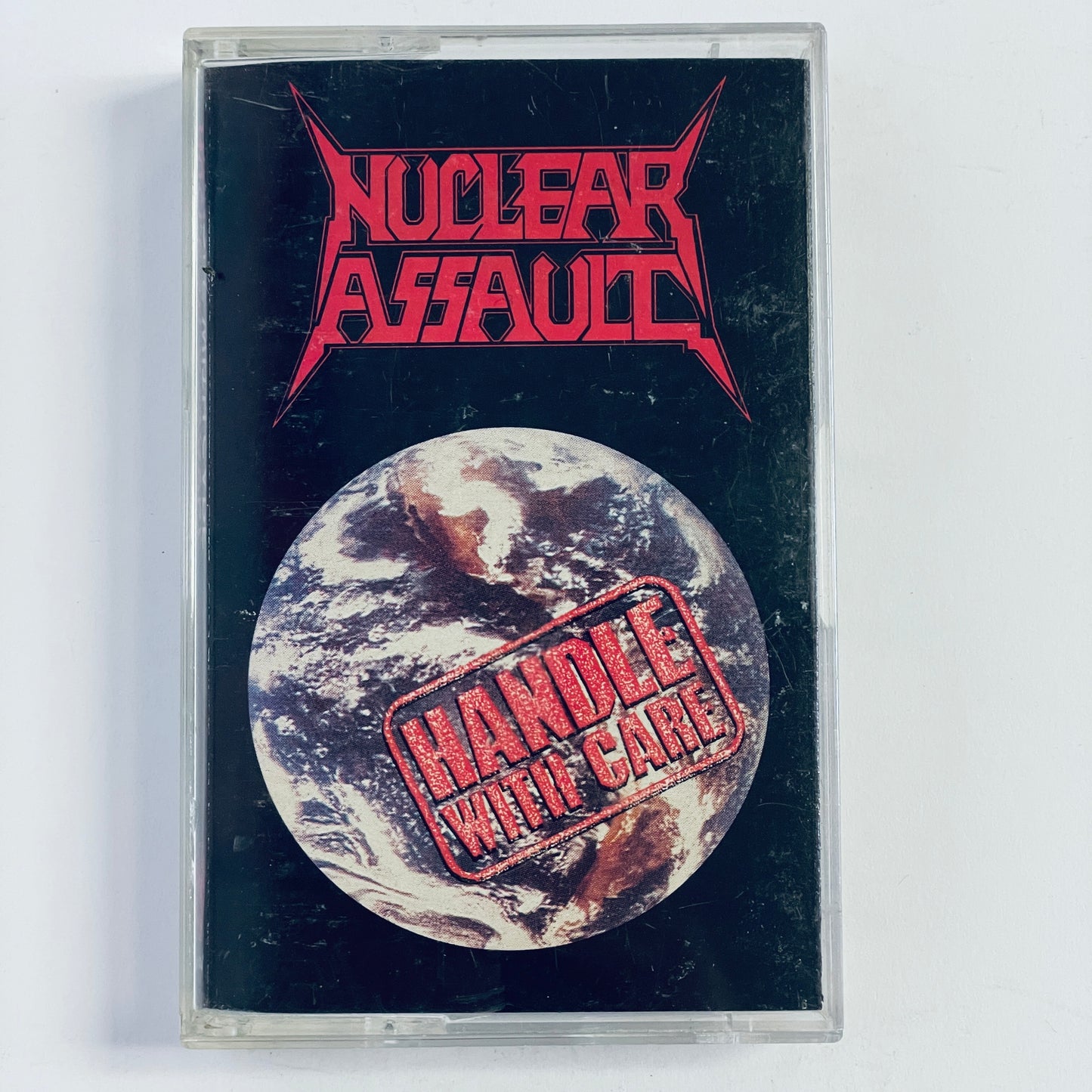 Nuclear Assault – Handle With Care cassette tape (used)